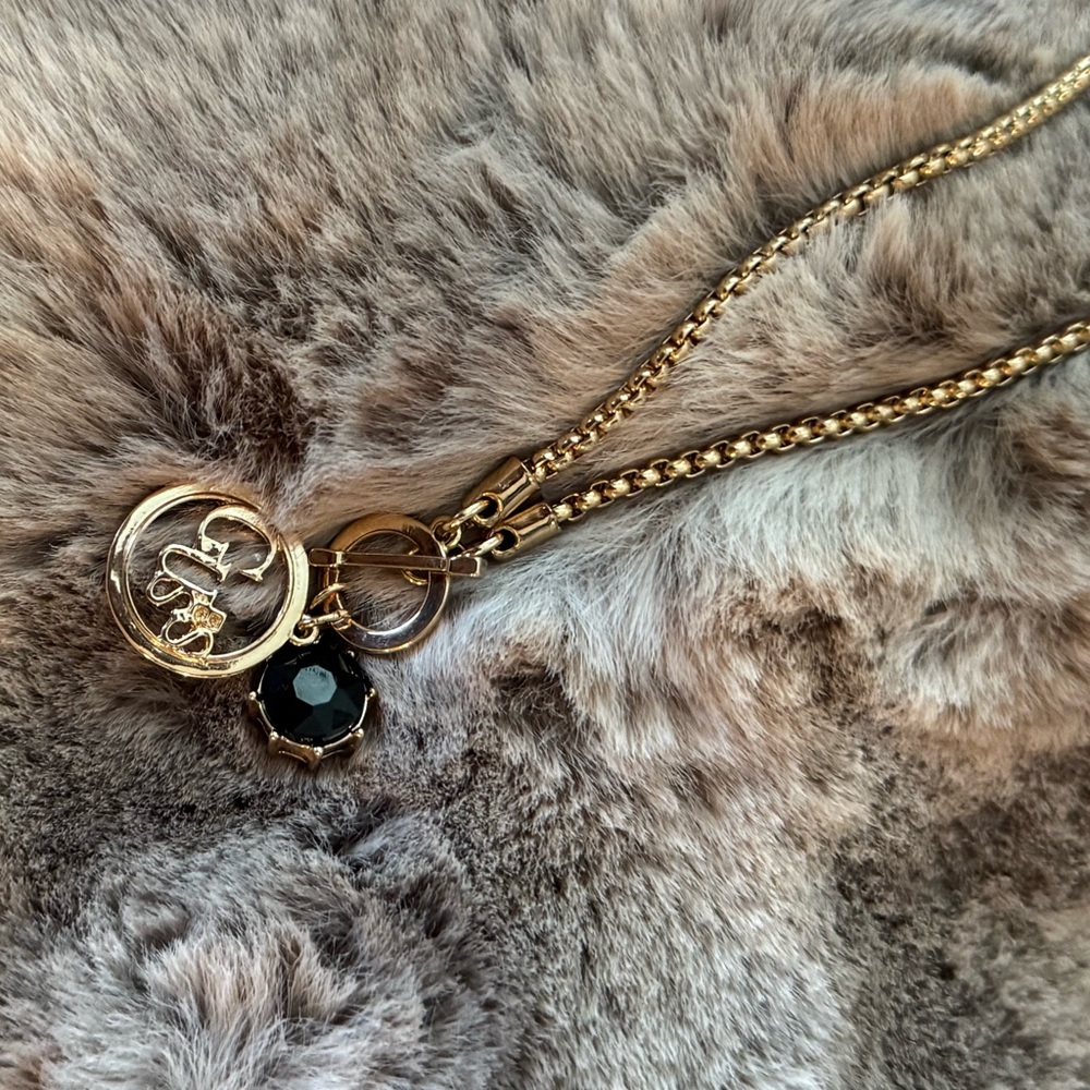 Gold-Tone Pendant Necklace with Black Stone
